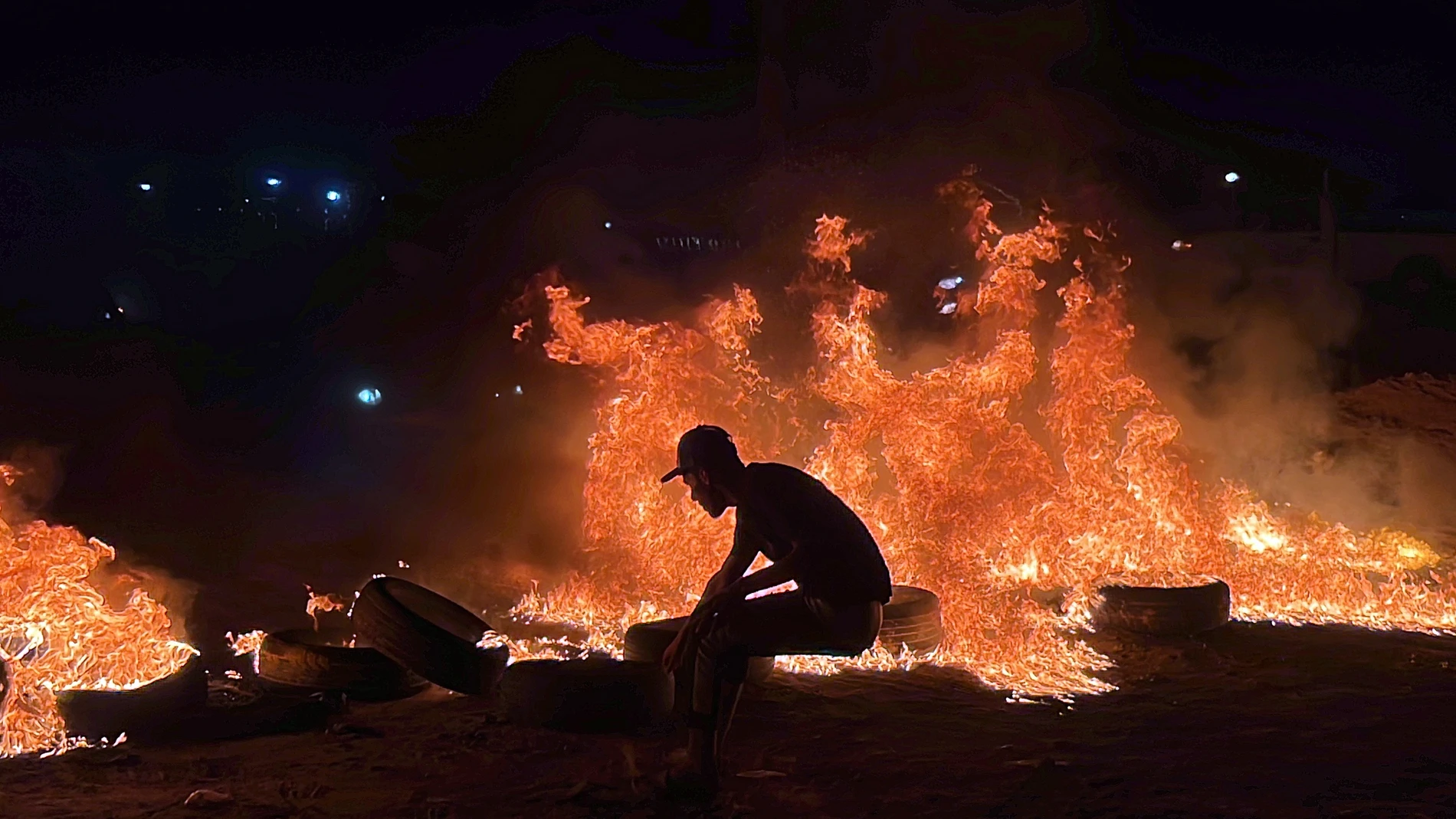 Tripoli (Libyan Arab Jamahiriya), 27/08/2023.- Libyan demonstrators burn tires to protest against the meeting of the Foreign Minister of the National Unity Government, Najla al-Mangoush, with her Israeli counterpart in Italy , in Tripoli, Libya on 27 August 2023. A statement released by the head of the Libyan government Abdelhamid Debaïbah, announced the suspension of the Libyan Minister of Foreign Affairs and the opening of an administrative investigation, which will be carried out by a comm...