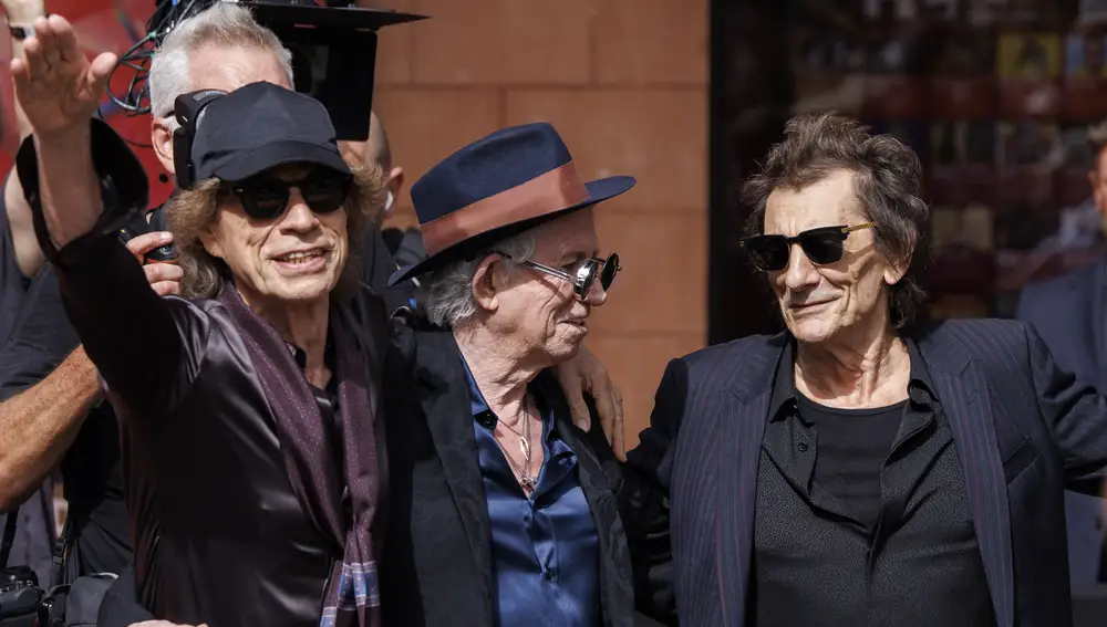 The Rolling Stones members Mick Jagger, Keith Richards and Ronnie Wood greet fans at the launch event of The Rolling Stones' new album 'Hackney Diamonds' at Hackney Empire in London, Britain, 06 September 2023. 'Hackney Diamonds' is the band's first album of original songs since 2005 and it was first hinted to the fans by an ad placed in a local newspaper in Hackney, supposedly for a glass repair store but featuring lyrics from their hits.