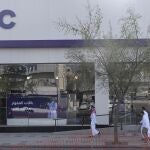 People walk outside Saudi Telecommunication Company (stc) office in Riyadh, Saudi Arabia, 06 September 2023. Saudi Telecommunication Company (STC) group announced that it had acquired a 9.9 percent interest in Telefonica S.A., one of the largest telecommunications companies in the world.