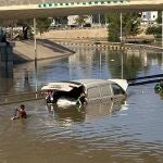 - (Libyan Arab Jamahiriya), 11/09/2023.- A handout photo made available by the Libyan Red Crescent shows members of the organization recovering vehicles from the floods at an undefined location in eastern Libya, 11 August 2023 (issued 13 September 2023). The Red Cresent said that the floods caused by storm Daniel on 10 September in eastern Libya left thousands of people dead and missing. (Inundaciones, tormenta, Libia) EFE/EPA/HANDOUT HANDOUT EDITORIAL USE ONLY/NO SALES
