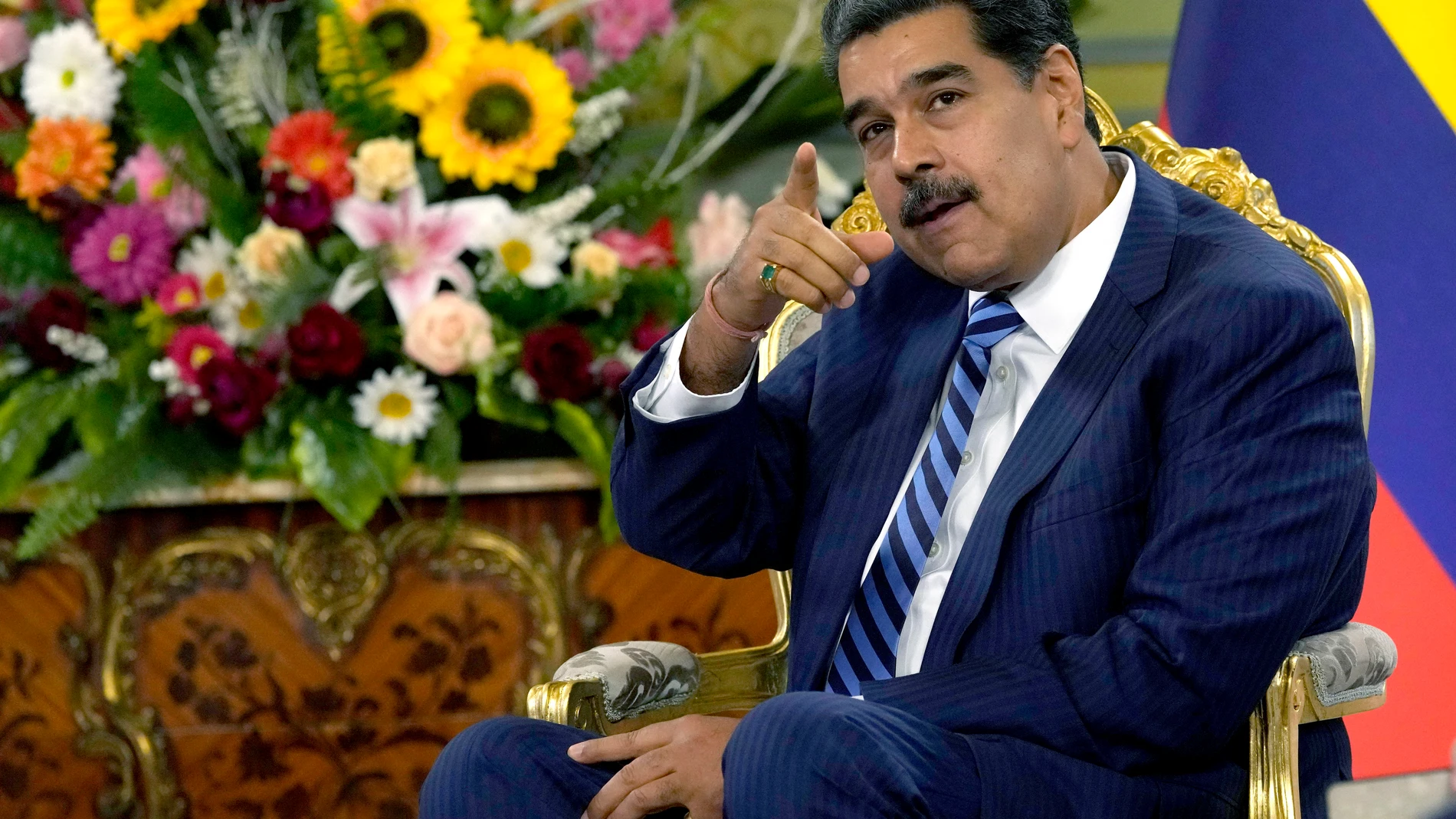 FILE -Venezuela's President Nicolas Maduro points while meeting Colombia's new ambassador to Venezuela, at the Miraflores Presidential Palace in Caracas, Venezuela, Wednesday, Aug. 16, 2023. United Nations human rights experts are criticizing Venezuela’s government for stepping up efforts to curtail democratic freedoms with use of threats, surveillance and harassment as President Nicolás Maduro faces reelection next year. (AP Photo/Ariana Cubillos, File)
