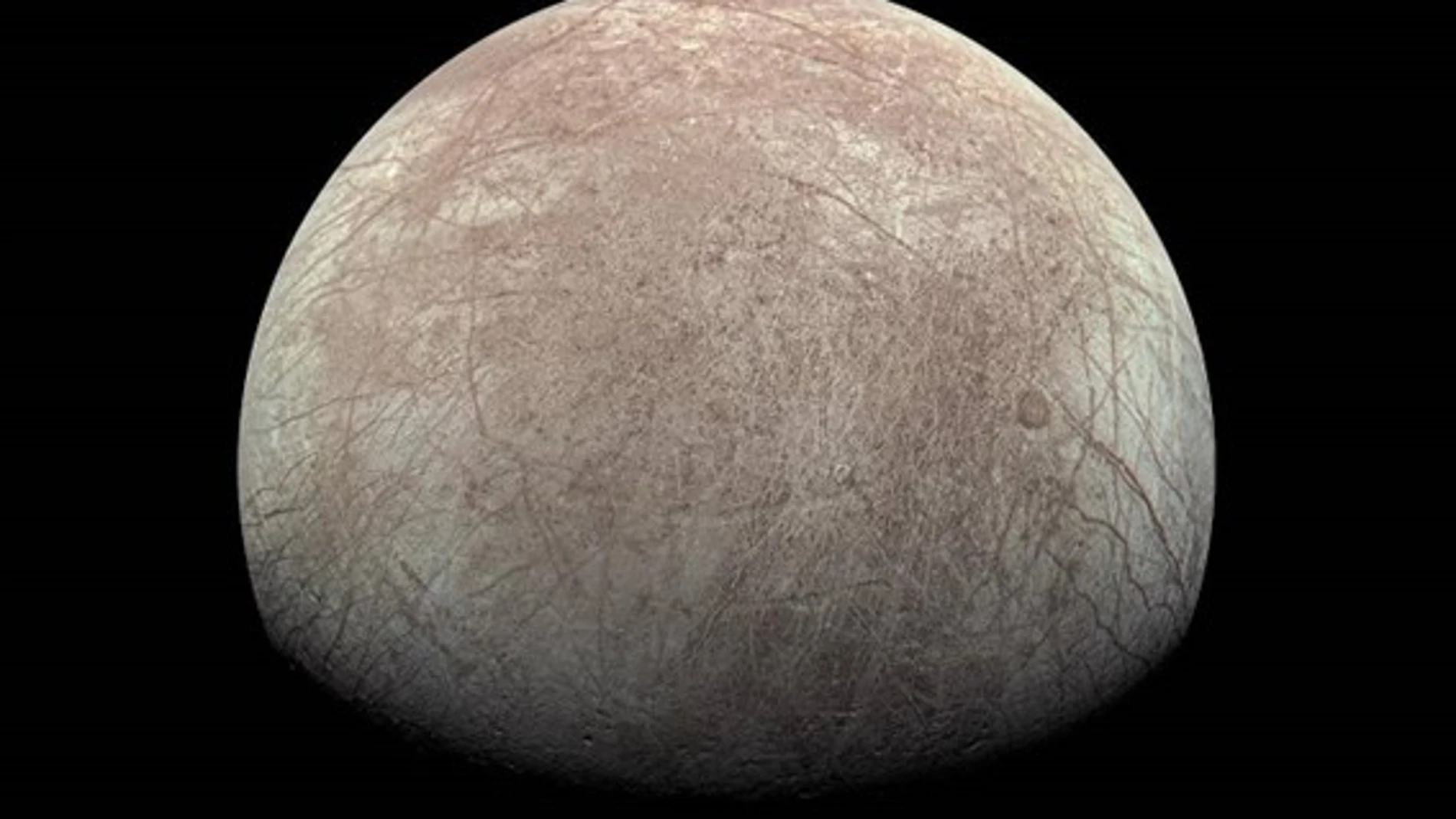 Europa fotografiada en 2022 por la sonda Juno, de la NASA