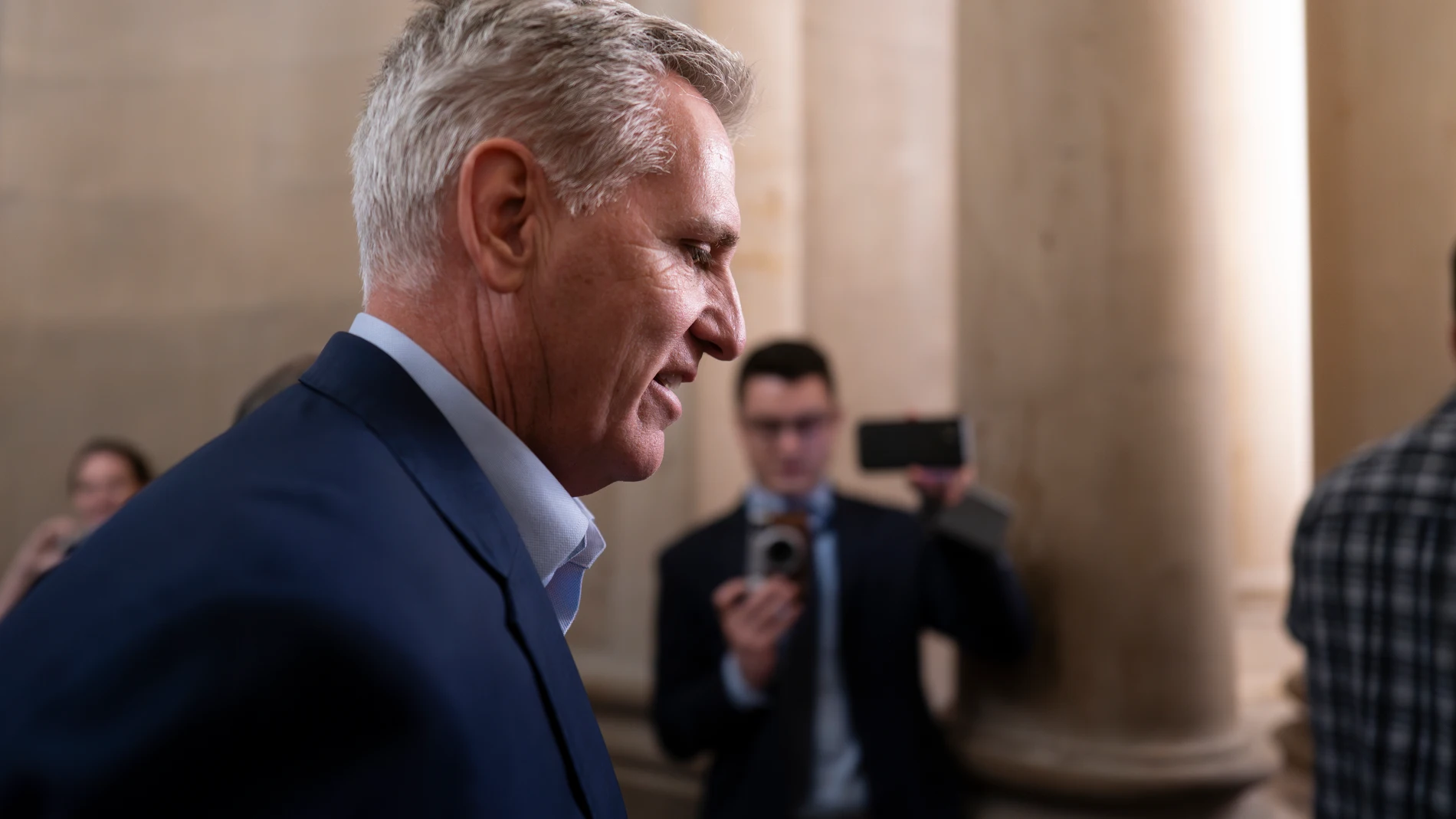 Former Speaker of the House Kevin McCarthy, R-Calif., departs the office still bearing his nameplate after a day of meetings, at the Capitol in Washington, Thursday, Oct. 5, 2023. McCarthy was voted out of the job of speaker this week by a contingent of hard-right conservatives in an extraordinary showdown, a first in U.S. history. (AP Photo/J. Scott Applewhite)