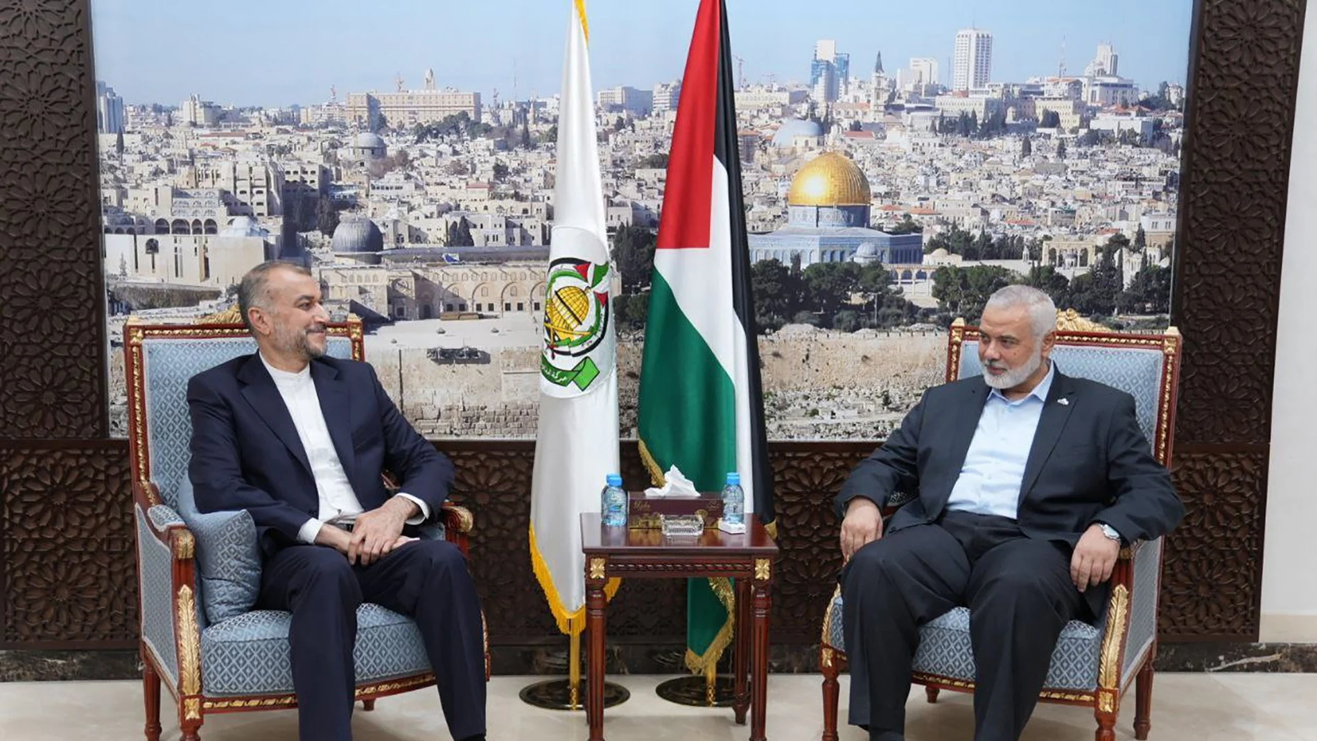 Iranian Foreign Minister Hossein Amir-Abdollahian (L) and Palestinian Islamist group Hamas leader Ismail Haniyeh (R) during a meeting in Doha, Qatar.