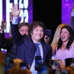 Javier Milei, presidential candidate of the Liberty Advances coalition, waves at his campaign headquarters after polls closed for general elections in Buenos Aires, Argentina, Sunday, Oct. 22, 2023.