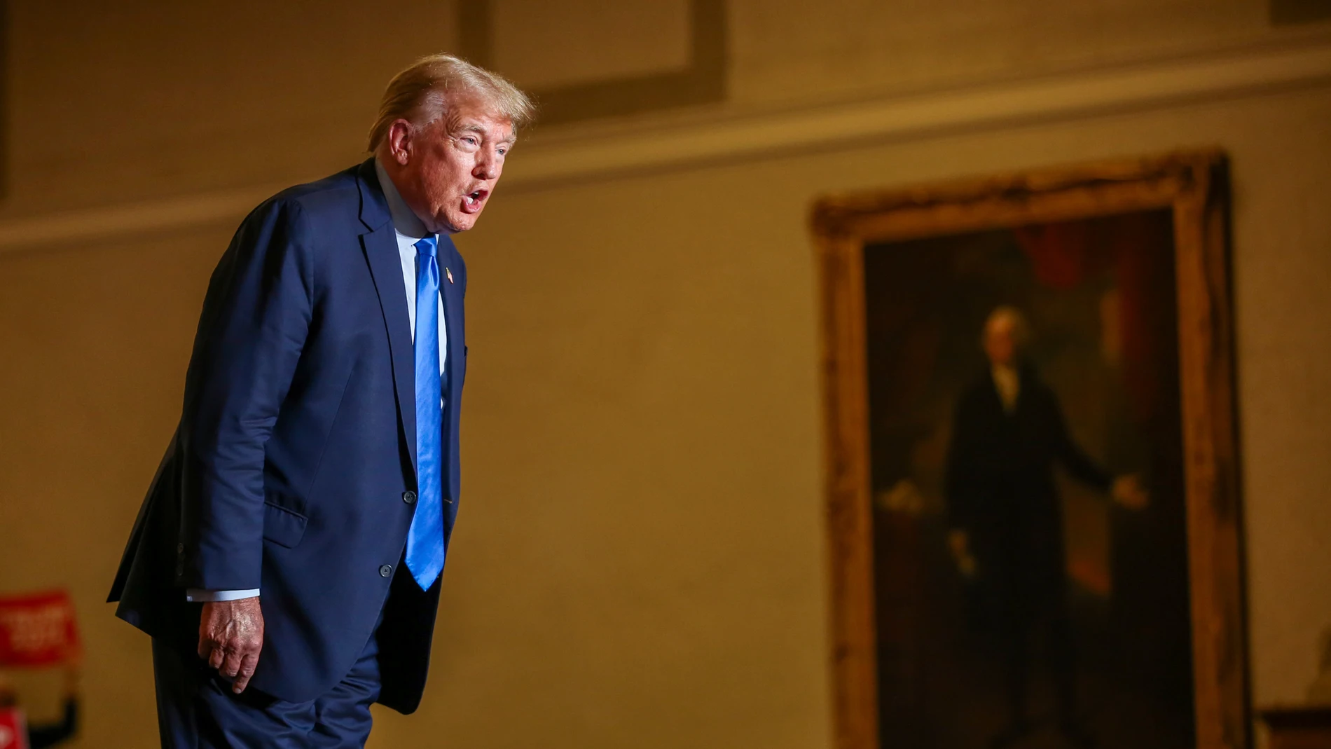 Former President Donald Trump greets the crowd at a campaign rally Saturday, Nov. 11, 2023, in Claremont, N.H. (AP Photo/Reba Saldanha)