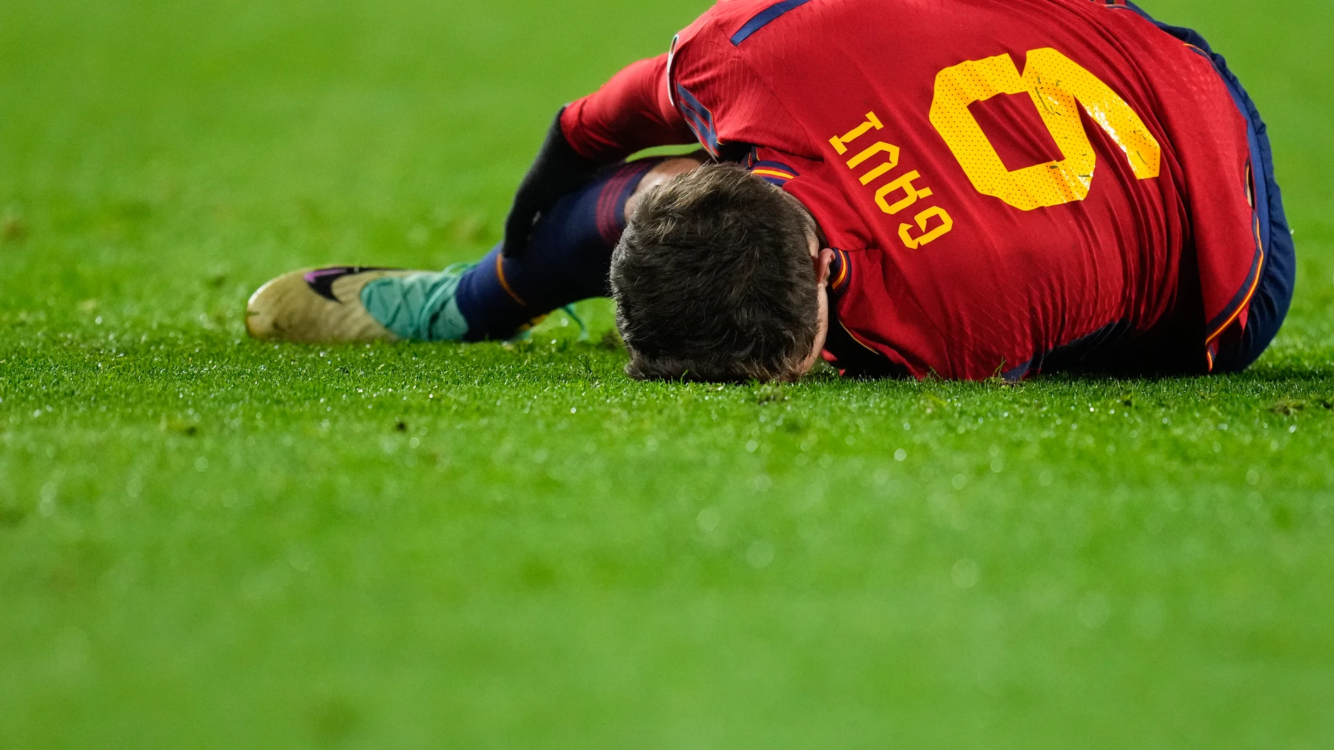 Spain's Gavi Paez reacts after injuring his leg during the Euro 2024 group A qualifying soccer match between Spain and Georgia at Jose Zorrilla Stadium in Valladolid, Spain, Sunday, Nov. 19 23, 2023. (AP Photo/Manu Fernandez)