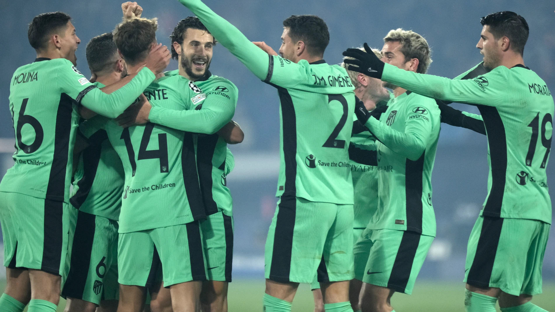 Atletico Madrid's players celebrate their sides first goal during the Champions League, Group E soccer match between Feyenoord and Atletico Madrid at the Feyenoord stadium, in Rotterdam, Netherlands, Tuesday, Nov. 28, 2023. (AP Photo/Patrick Post)