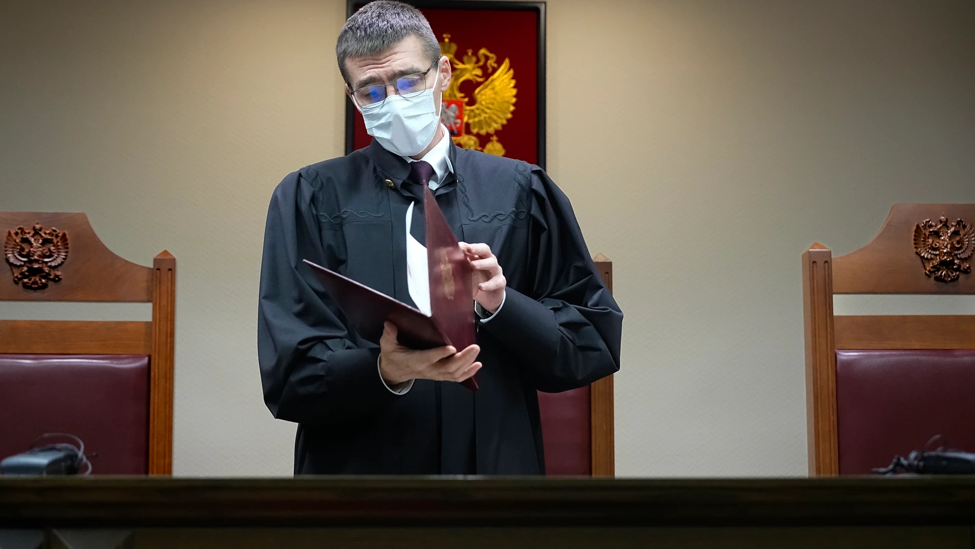 Russian Supreme Court judge Oleg Nefedov leads a hearing in the Russian Supreme Court in Moscow, Russia, Thursday, Nov. 30, 2023. Russia's Supreme Court on Thursday effectively outlawed LGBTQ+ activism, the most drastic step against advocates of gay, lesbian and transgender rights in the increasingly conservative country. The court sided with the Justice Ministry, which filed a lawsuit this month demanding an LGBTQ+ "movement" in Russia to be labeled extremist. Rights activists argue the move...