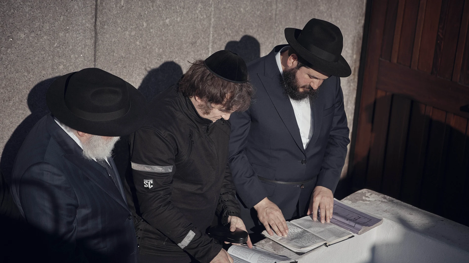 Argentina's President-elect, Javier Milei, center, prays next to Chabad-Lubavitch rabbis at the resting place of the Rebbe, Rabbi Menachem Mendel Schneerson, at Montefiore Cemetery on Monday, Nov. 27, 2023, in the Queens borough of New York.