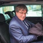 Member of the European Parliament Carles Puigdemont leaves a press conference in Brussels, Belgium.