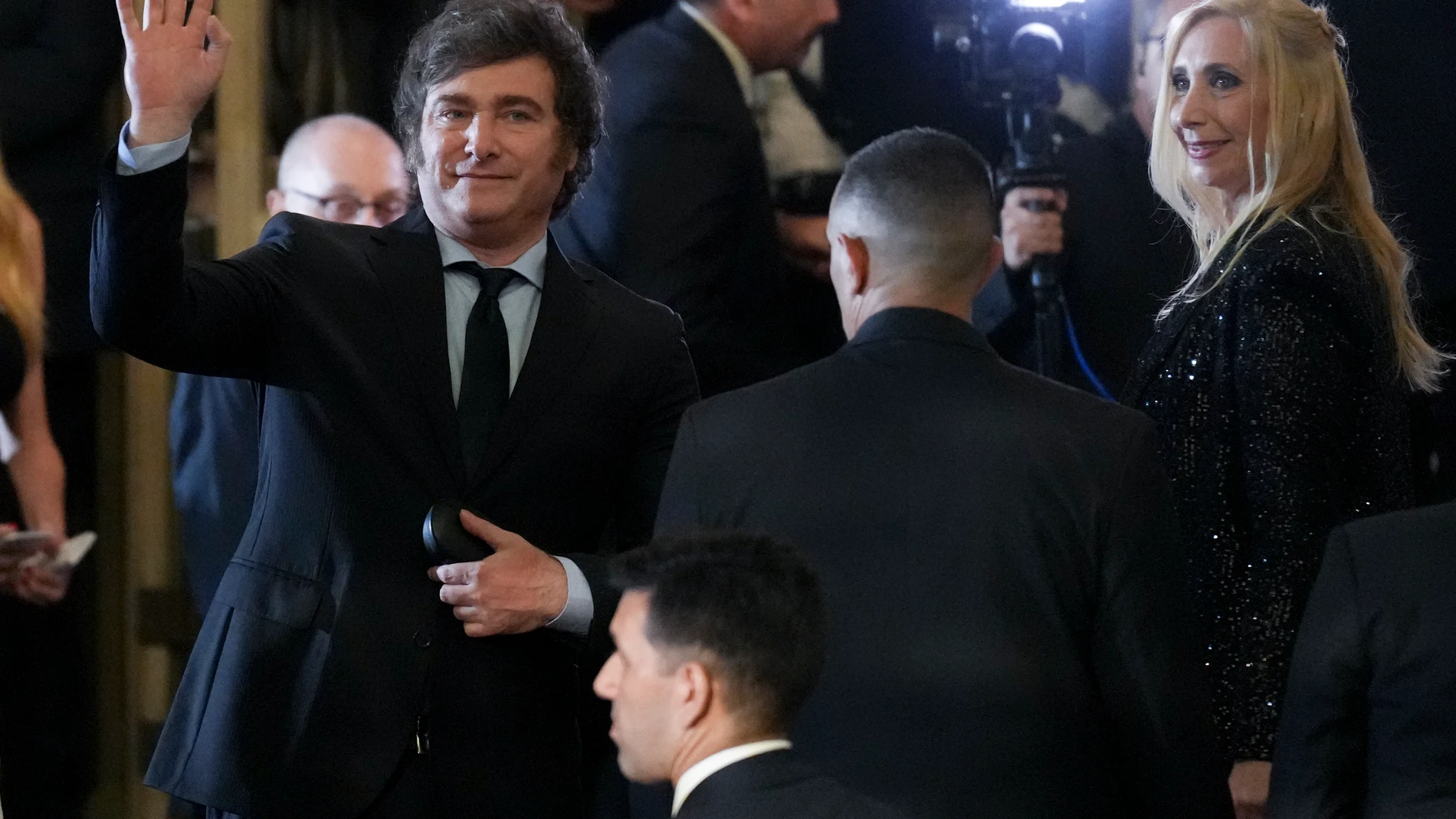 Argentina's newly sworn-in President Javier Milei, left, and his sister Karina arrive to the Colon Theater for a gala event in Buenos Aires, Argentina, Sunday, Dec. 10, 2023. (AP Photo/Matilde Campodonico)
