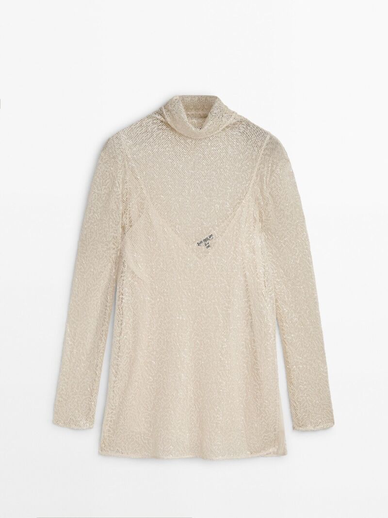 Blusa lentejuelas cuello alto