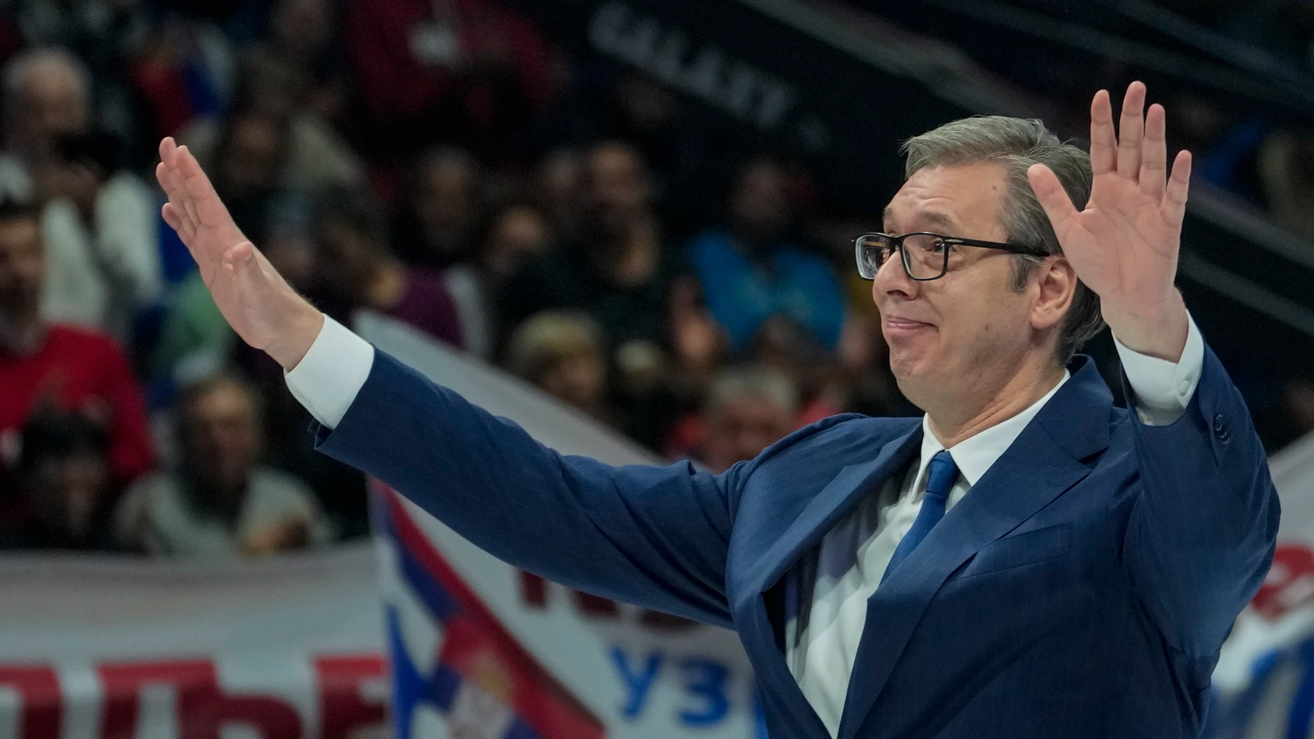 Serbian President Aleksandar Vucic waves to his supporters during a pre-election rally of his ruling Serbian Progressive Party in Belgrade, Serbia, Saturday, Dec. 2, 2023. Serbia's President Vucic is pushing hard to reassert his populist party's dominance at this weekend's early parliamentary and local elections that observers say are being held in an atmosphere of intimidation and media bias. (AP Photo/Darko Vojinovic)