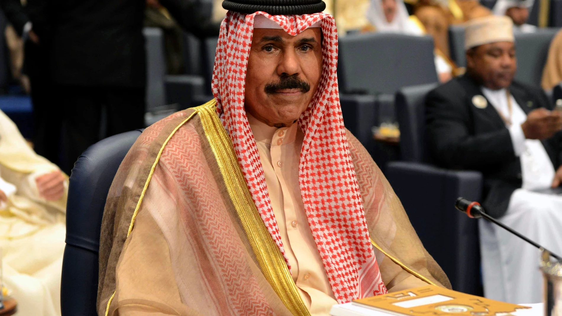 FILE - Kuwait's then-Crown Prince Sheik Nawaf Al-Ahmad Al-Jaber Al-Sabah attends the closing session of the 25th Arab Summit in Bayan Palace in Kuwait City, Wednesday, March 26, 2014. Kuwait's ruling emir, the 86-year-old Sheikh Nawaf Al Ahmad Al Sabah, has died, state television reported Saturday, Dec. 16, 2023. (AP Photo/Nasser Waggi, File)