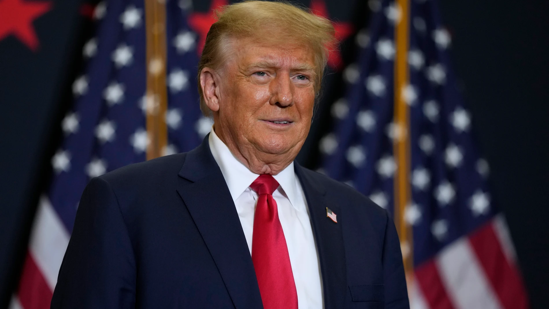 Former President Donald Trump speaks during a commit to caucus rally, Tuesday, Dec. 19, 2023, in Waterloo, Iowa. (AP Photo/Charlie Neibergall)