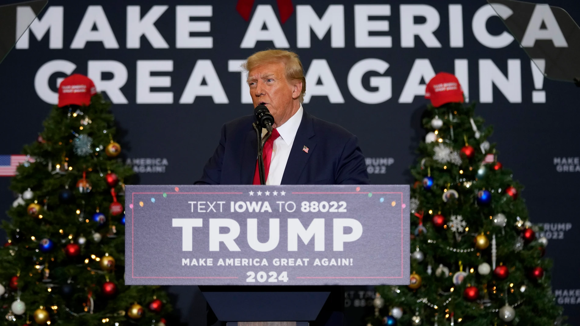 Former President Donald Trump speaks during a commit to caucus rally, Tuesday, Dec. 19, 2023, in Waterloo, Iowa. (AP Photo/Charlie Neibergall)