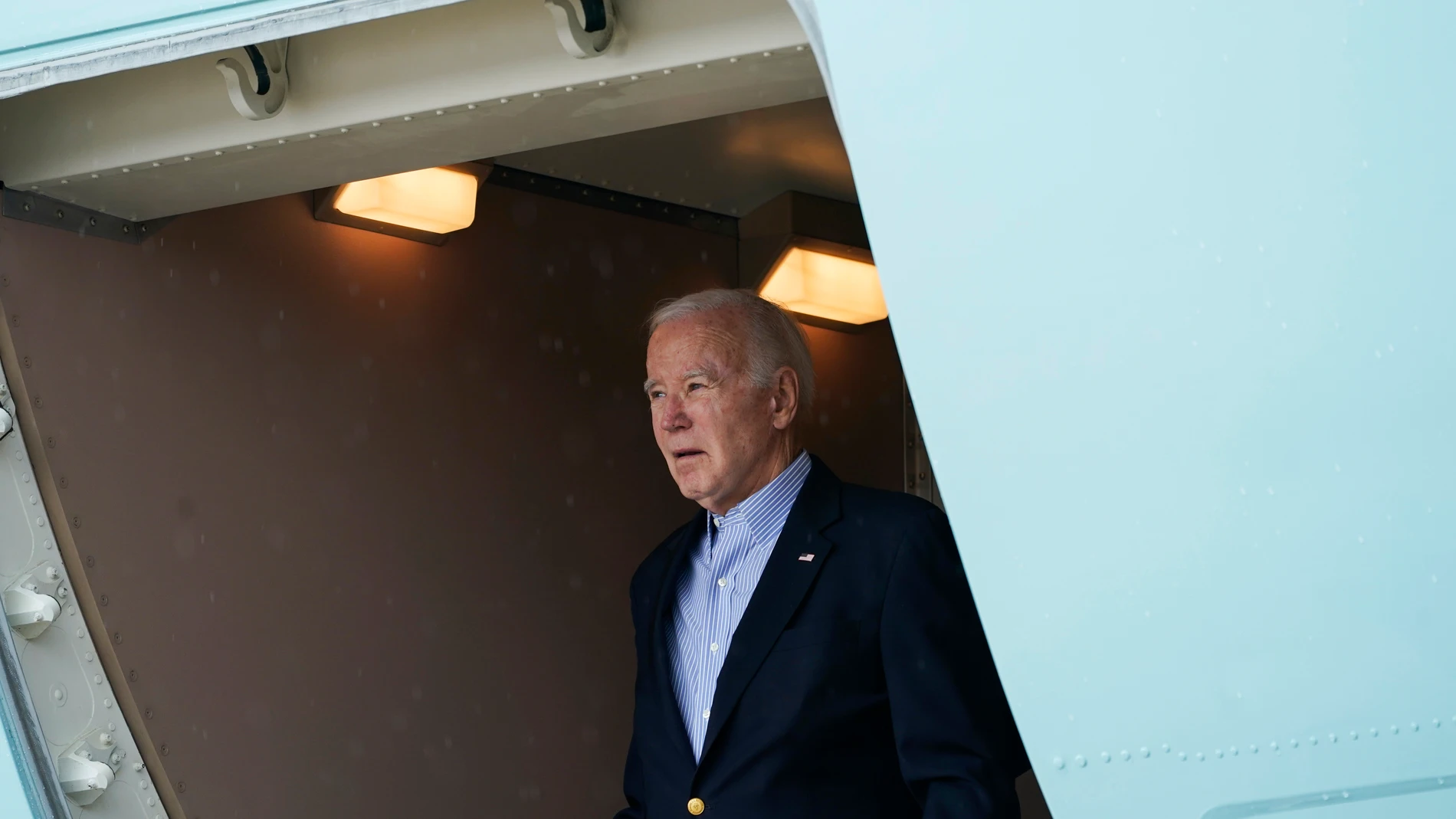 President Joe Biden exits Air Force One upon arrival at Henry E. Rohlsen Airport, in St. Croix, U.S. Virgin Islands, Wednesday, Dec. 27, 2023. Biden is spending the New Year in St. Croix with family. (AP Photo/Stephanie Scarbrough)