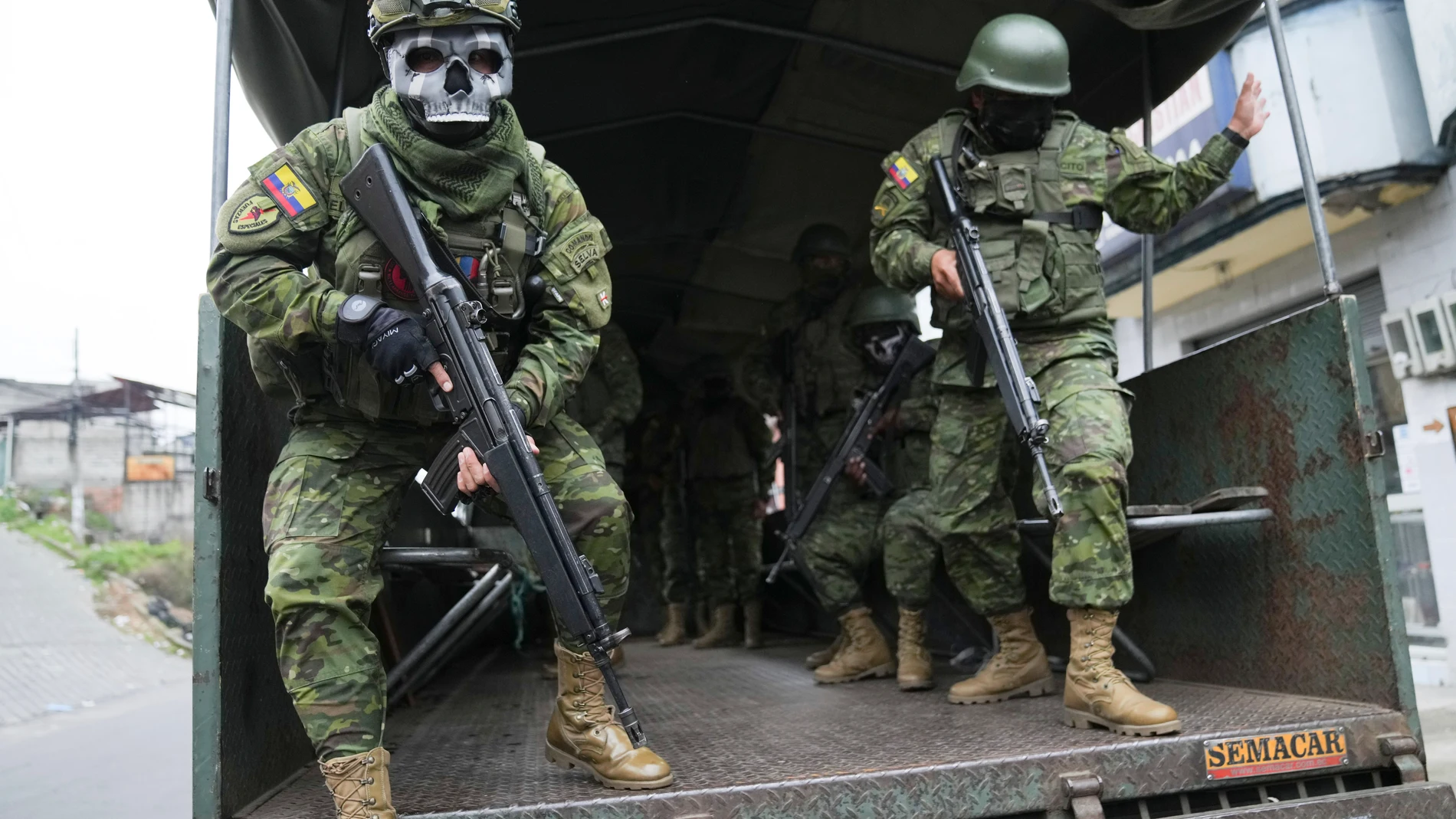 Soldiers patrol a residential area on the south side of Quito, Ecuador, Friday, Jan. 12, 2024, in the wake of the apparent escape of a powerful gang leader from prison. President Daniel Noboa decreed Monday a national state of emergency, a measure that lets authorities suspend people’s rights and mobilize the military in places like the prisons. The government also imposed a curfew from 11 p.m. to 5 a.m. (AP Photo/Dolores Ochoa)