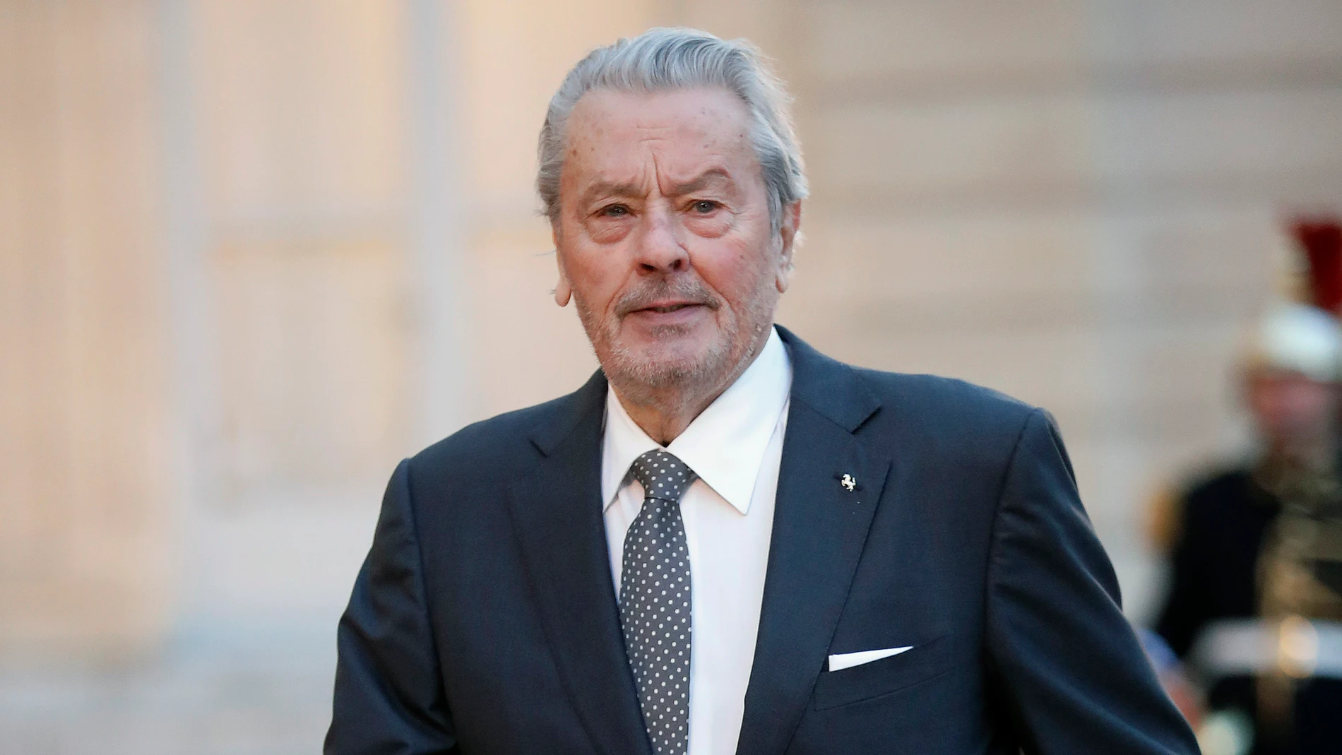 French actor Alain Delon arrives to attend a state dinner at the Elysee Palace, in Paris, Monday, March 25, 2019. Chinese President Xi Jinping is on a 3-day state visit in France where he is expected to sign a series of bilateral and economic deals on energy, the food industry, transport and other sectors.