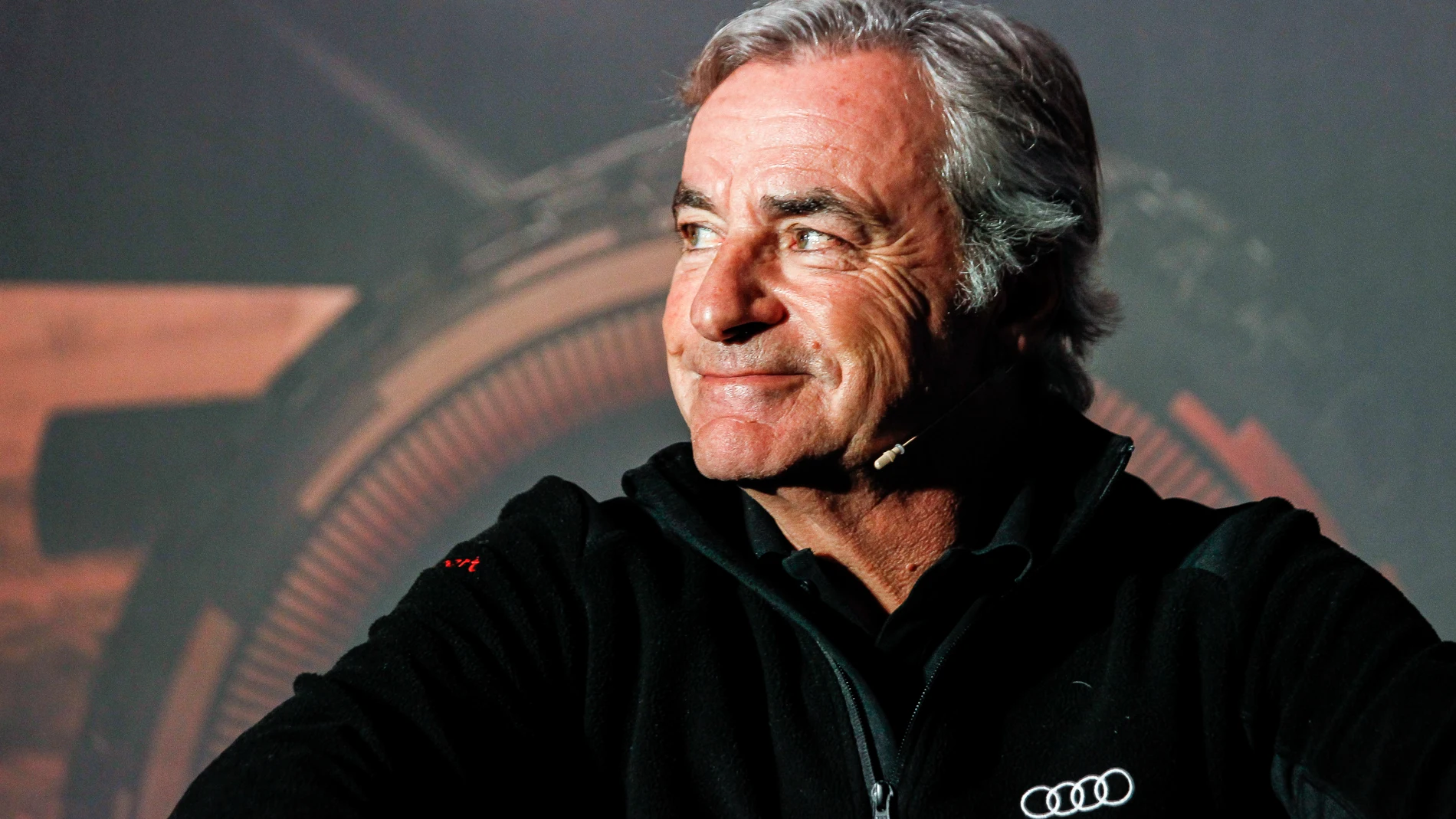 Carlos Sainz, Spanish pilot driver, looks on during the press conference after winning the Dakar Rally 2024 celebrated at Audi Center Madrid Norte on January 20, 2024, in Madrid, Spain. AFP7 20/01/2024 ONLY FOR USE IN SPAIN