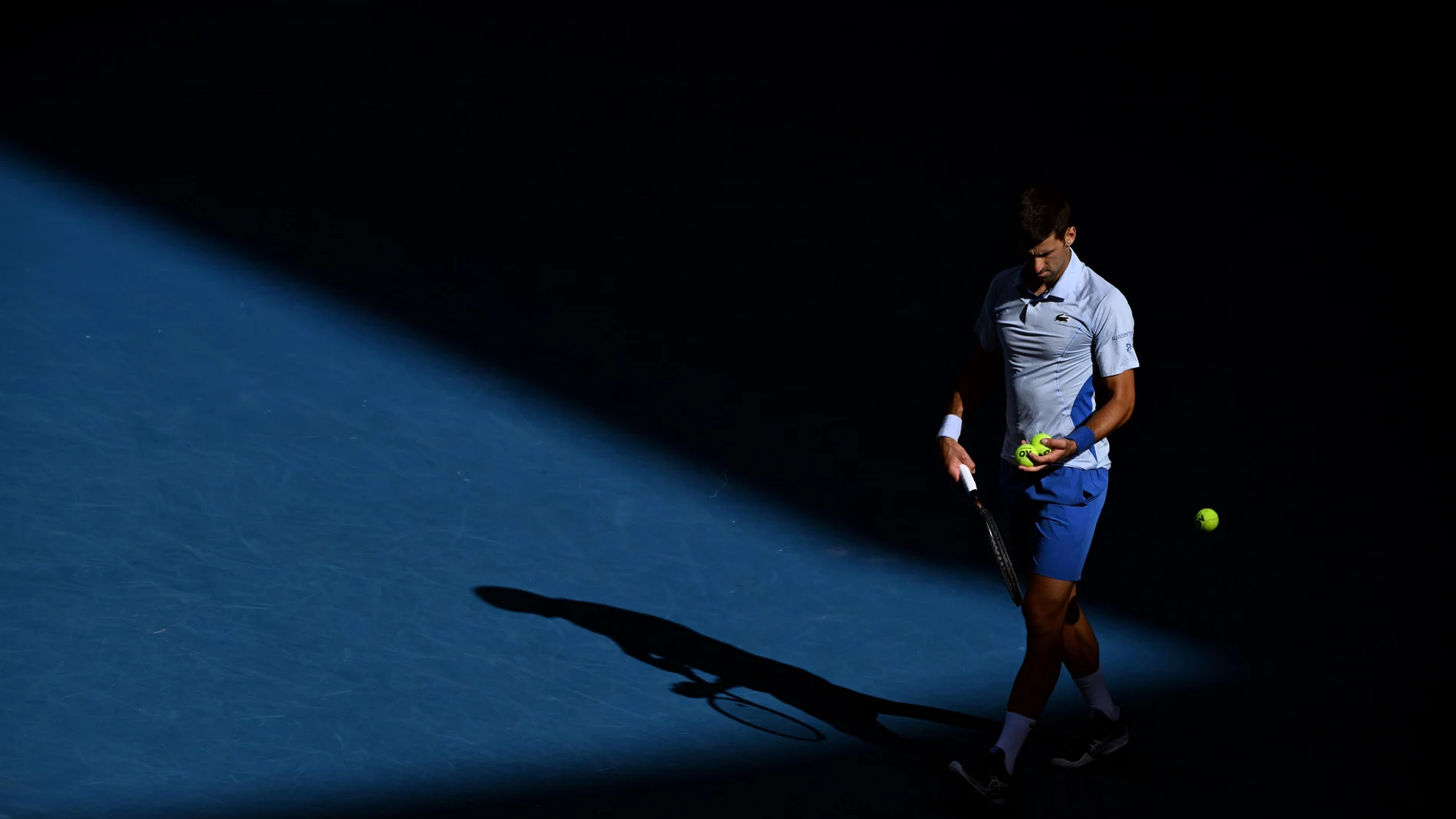 Novak Djokovic of Serbia in action during his Men'Äôs semifinal against Jannik Sinner of Italy on Day 13 of the 2024 Australian Open at Melbourne Park in Melbourne, Australia.