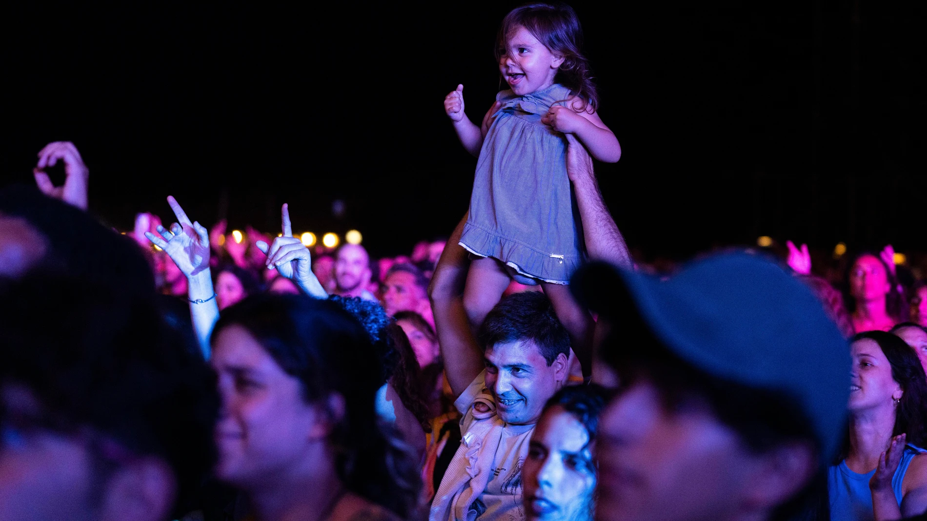 Music fans listen to Uruguay's Ana Prada and Jorge Drexler perform at the 'Canelones Suena Bien 2024' music festival, in Atlantida, Uruguay, Tuesday, Jan. 30, 2024. (AP Photo/Matilde Campodonico)