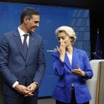  Spain's Prime Minister Pedro Sanchez and European Commission President Ursula von der Leyen pose at a media conference at the conclusion of a European Union summit in Brussels.