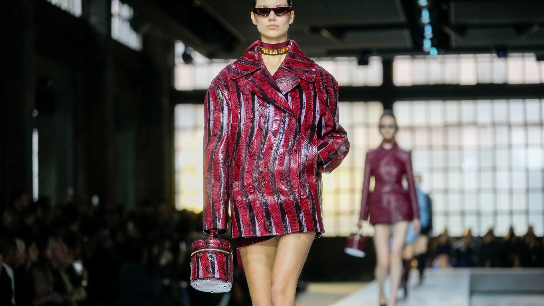 A model wears a creation as part of the Gucci women's Fall-Winter 2024-25 collection presented in Milan, Italy, Friday, Feb. 23, 2024. (AP Photo/Luca Bruno)