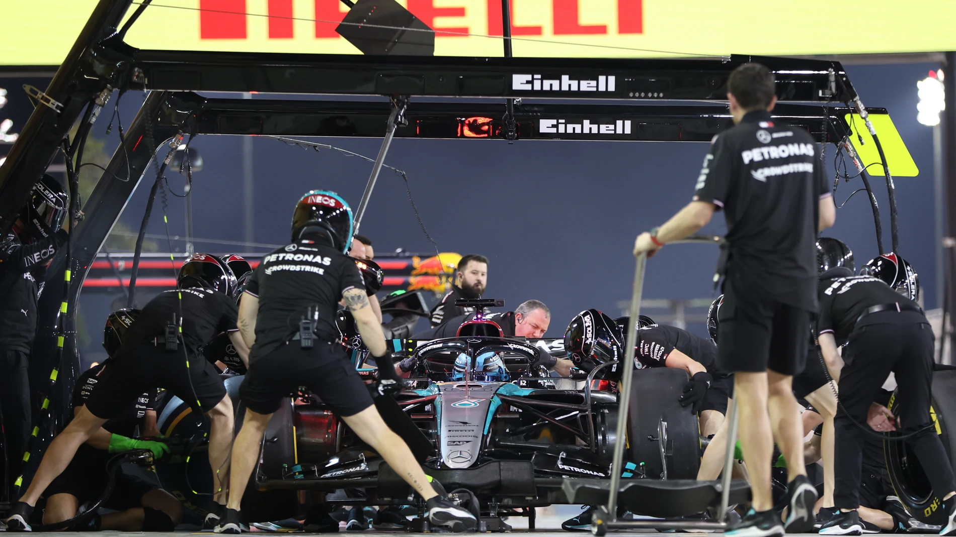 Sakhir (Bahrain), 23/02/2024.- Mechanics work in the pitlane of British Formula One driver George Russell of Mercedes-AMG Petronas during the pre-season testing for the 2024 Formula One season at the Bahrain International Circuit in Sakhir, Bahrain, 23 February 2024. (Fórmula Uno, Bahrein) EFE/EPA/ALI HAIDER
