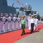 Myanmar's military chief Min Aung Hlaing (C) saluting Russian Navy personnel ahead of joint maritime exercises at Thilawa Port in Yangon.