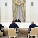 Russian President Putin meets other candidates in presidential elections