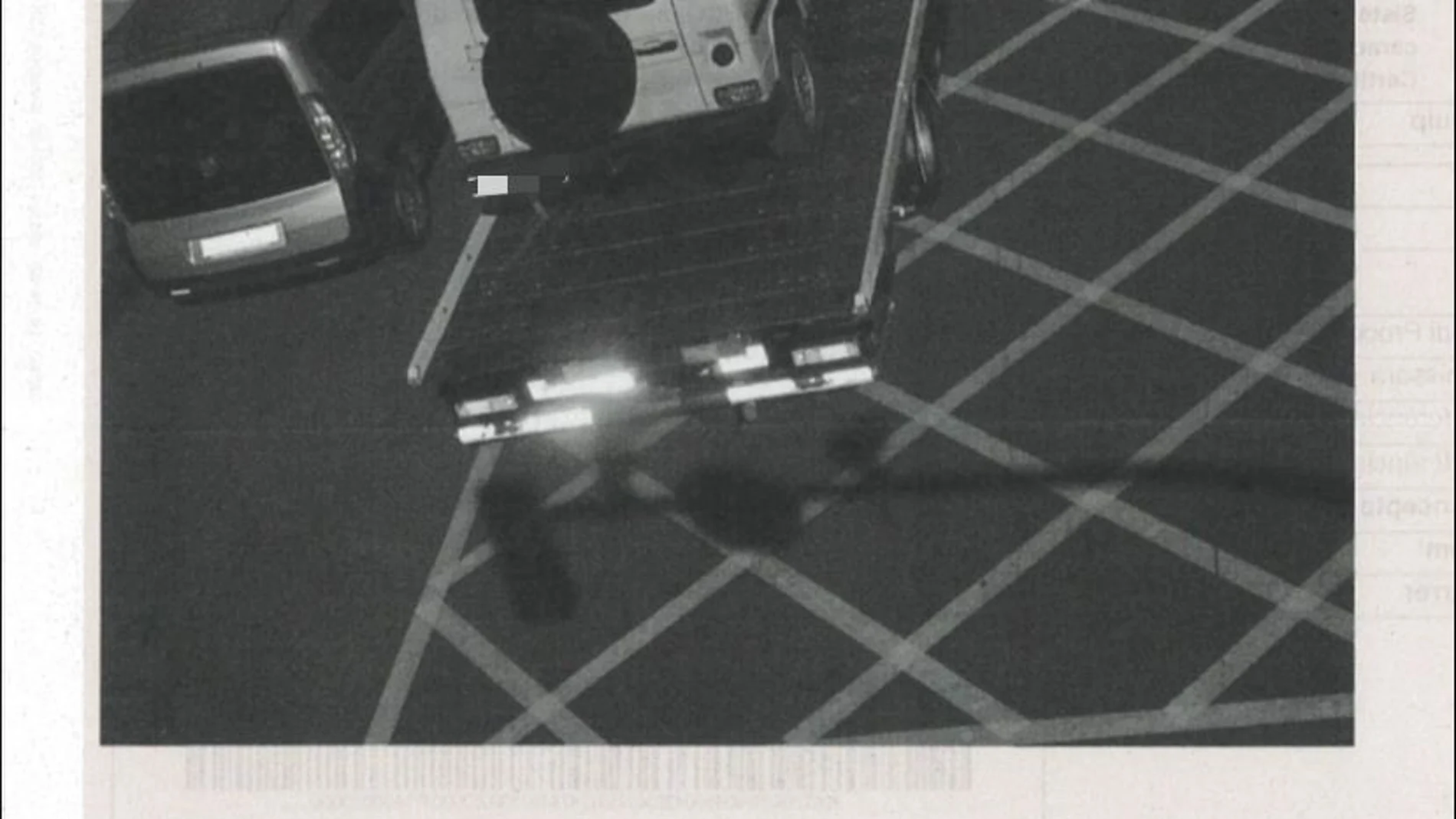 Imagen de la multa, con el coche remolcado