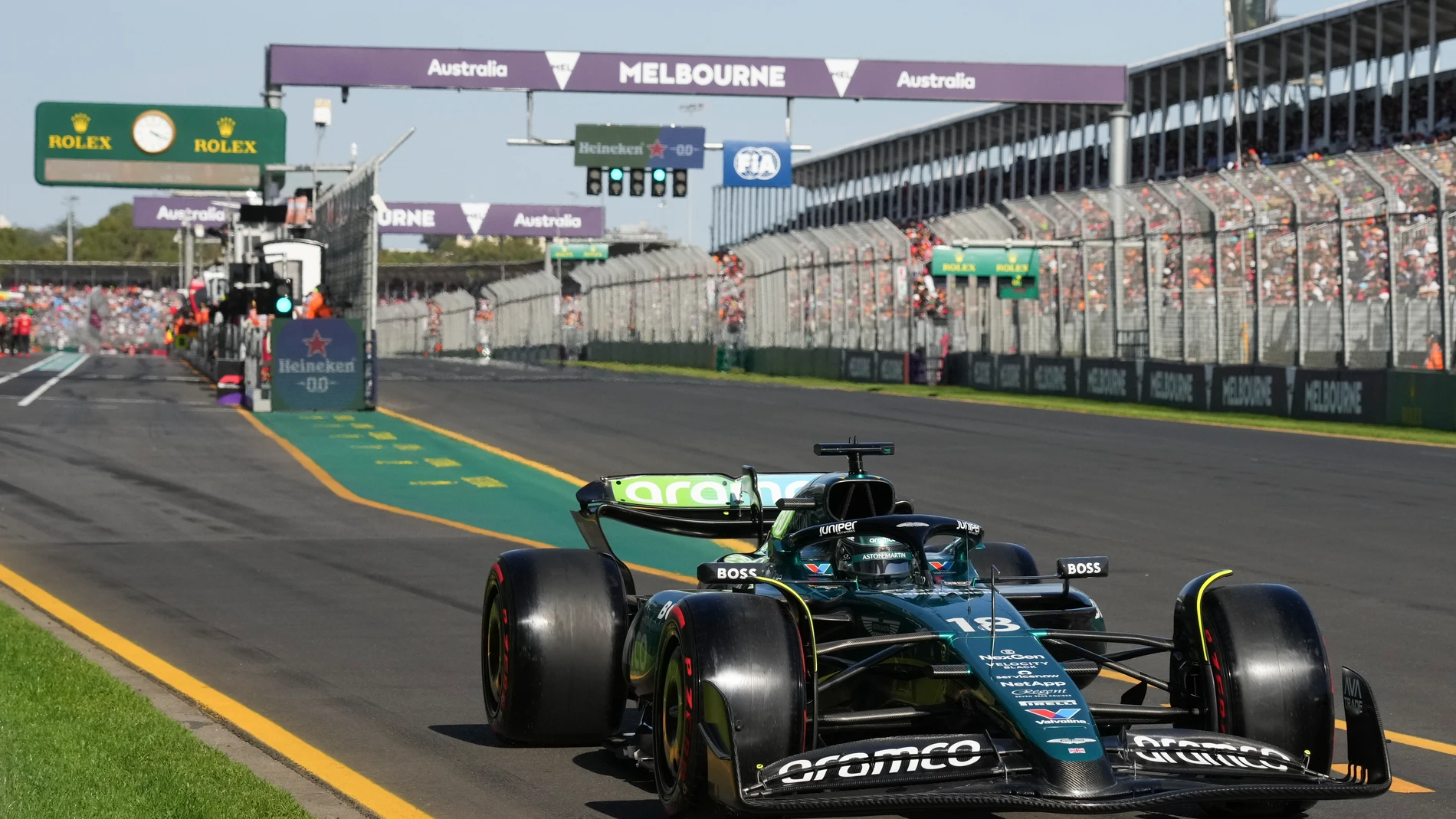 Aston Martin driver Lance Stroll of Canada steers his car out of pit lane during the second practice session of the Australian Formula One Grand Prix at Albert Park, in Melbourne, Australia, Friday, March 22, 2024. (AP Photo/Scott Barbour)