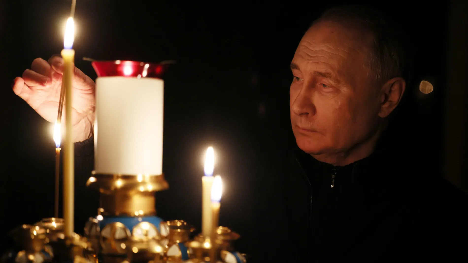 Moscow (Russian Federation), 24/03/2024.- Russian President Vladimir Putin lights a candle to commemorate the victims of a terrorist attack on the Crocus City Hall concert venue on a day of national mourning in Moscow, Russia, 24 March 2024. On 24 March, Russia observed a day of national mourning for the victims of the terrorist attack in Krasnogorsk's Crocus City Hall. At least 152 people were killed and more than 100 hospitalized after a group of gunmen attacked the concert hall in the Mosc...
