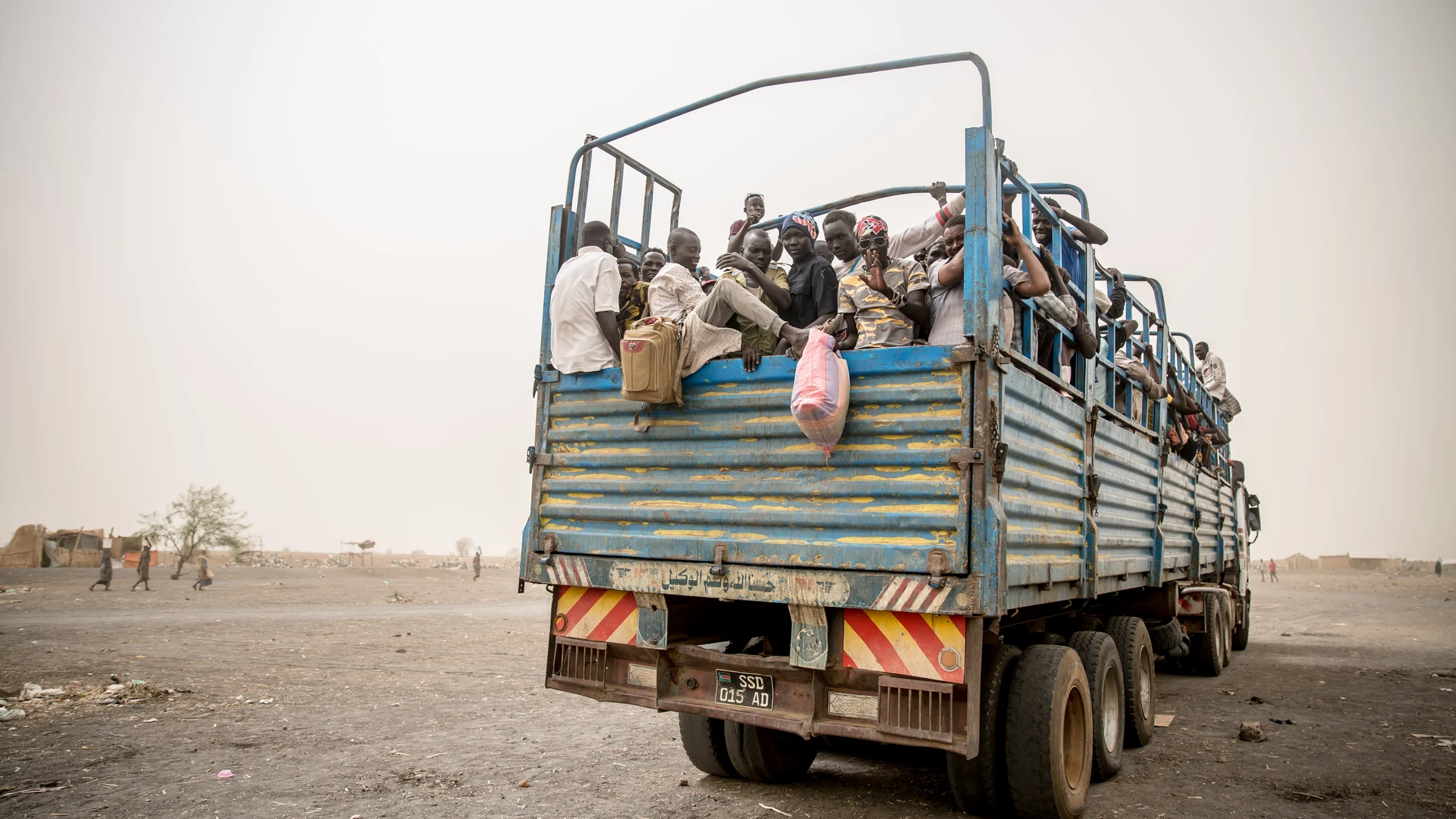 March 20, 2024, South Sudan: People are loaded into trucks to take them from Joda, on the Sudanese border, to Renk in South Sudan, where they will stay in a transit camp before they are transported further into the country. Around 1,000 South Sudanese returnees and Sudanese refugees are crossing the border from Sudan to South Sudan every day. Sudan's war, which began in April 2023, has resulted in the world's largest displacement crisis.20/03/2024