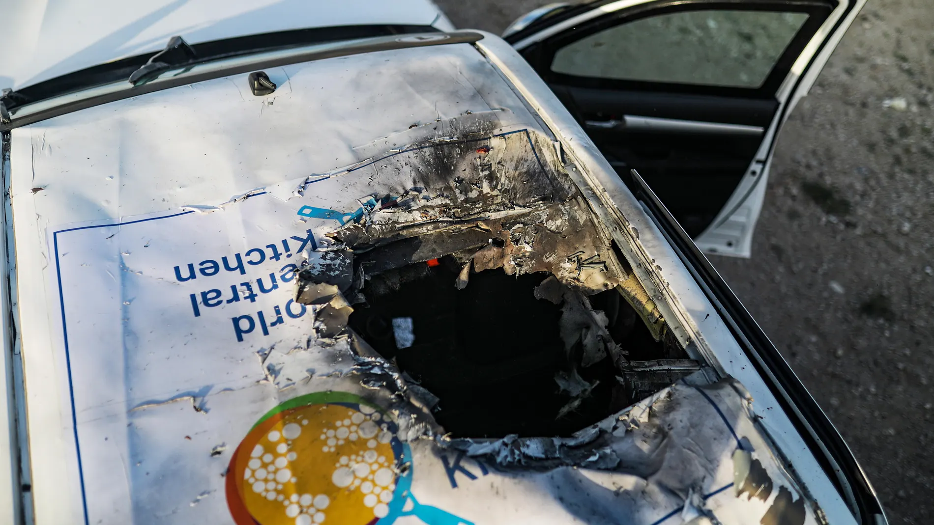 Deir Al Balah (---), 02/04/2024.- A destroyed car of the NGO World Central Kitchen (WCK) sits along Al Rashid road, between Deir Al Balah and Khan Younis in the southern Gaza Strip, 02 April 2024. According to the Palestinian Red Crescent, at least four people from the NGO World Central Kitchen (WCK) were killed when a missile hit their convoy in Deir al Balah while they were on their way from Rafah to Gaza City to receive fresh aid delivered by the Open Arms vessel. The victims were confirme...