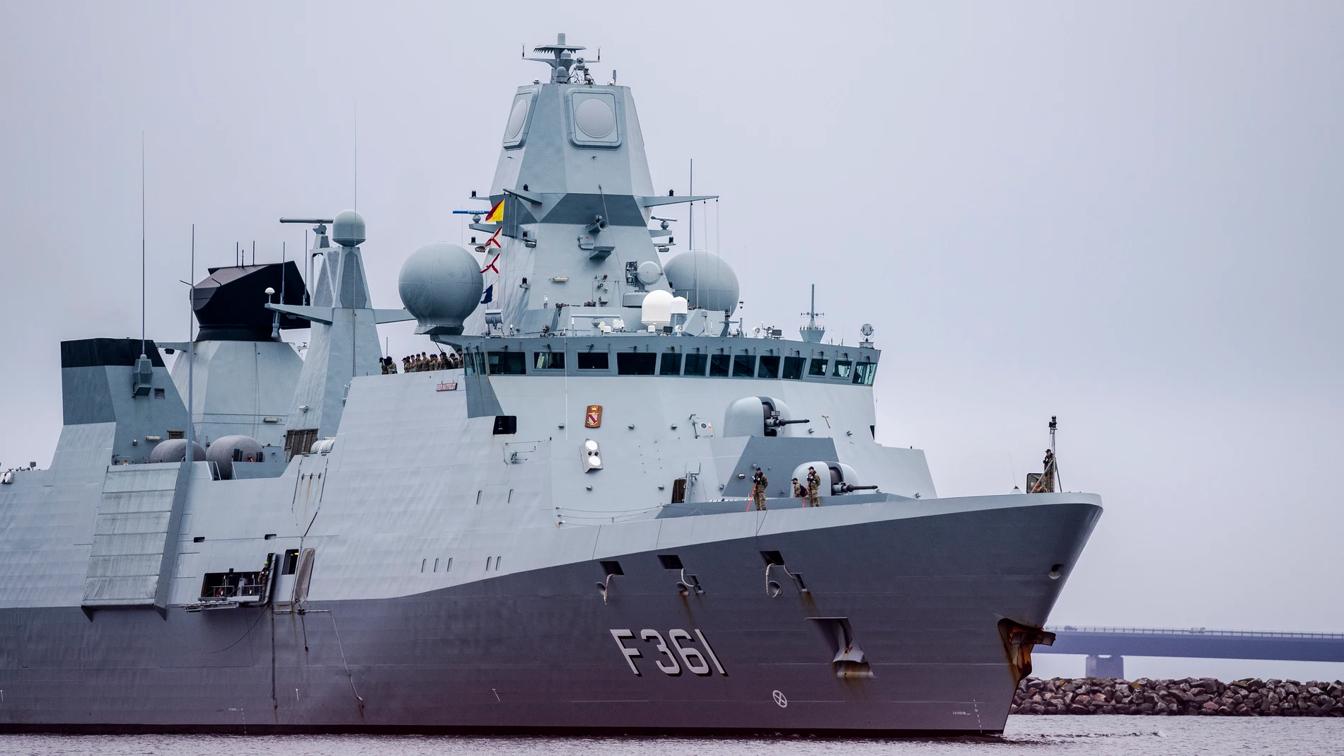 The frigate Iver Huitfeldt, number F361, arrives at the base port at Fleet Station Korsoer, Denmark, Thursday, April 4, 2024. Denmark's Armed Forces said a technical problem arose with a Harpoon missile on board the Danish frigate HDMS Niels Juel, number F363, the sister ship of the Iver Huitfeldt, as it was taking part in a test while anchored in the Korsoer naval base. (Ida Marie Odgaard/Ritzau Scanpix via AP)