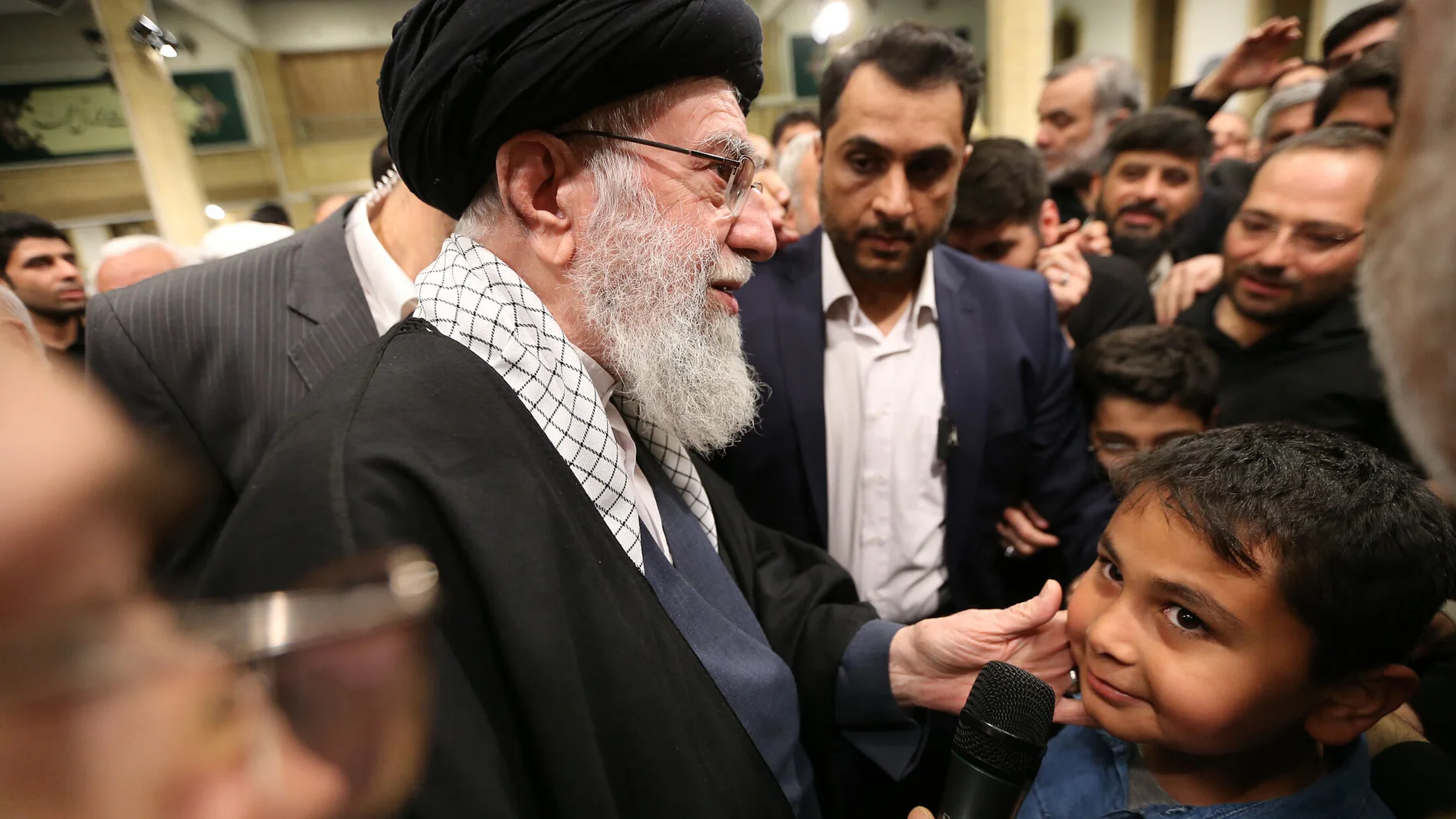 April 4, 2024, Tehran, Iran: Iranian supreme leader Ayatollah ALI KHAMENEI conversing with families and relatives of Revolutionary Guard Corps members killed in a strike on the country's consular annex in Damascus, which Tehran blamed on Israel, ahead of their funeral procession. at least seven IRGC military advisors, including two generals, were killed in an airstrike on the Iranian consulate building in Syria's capital Damascus on 01 April. Iran has blamed Israel for the attack and vowed to...