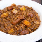 Arroz meloso con secreto de cerdo y manzana