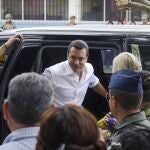 President Daniel Noboa arrives to vote in a referendum to endorse new security measures to crackdown on criminal gangs responsible for increasing violence, in Olon, Ecuador, Sunday, April 21, 2024.