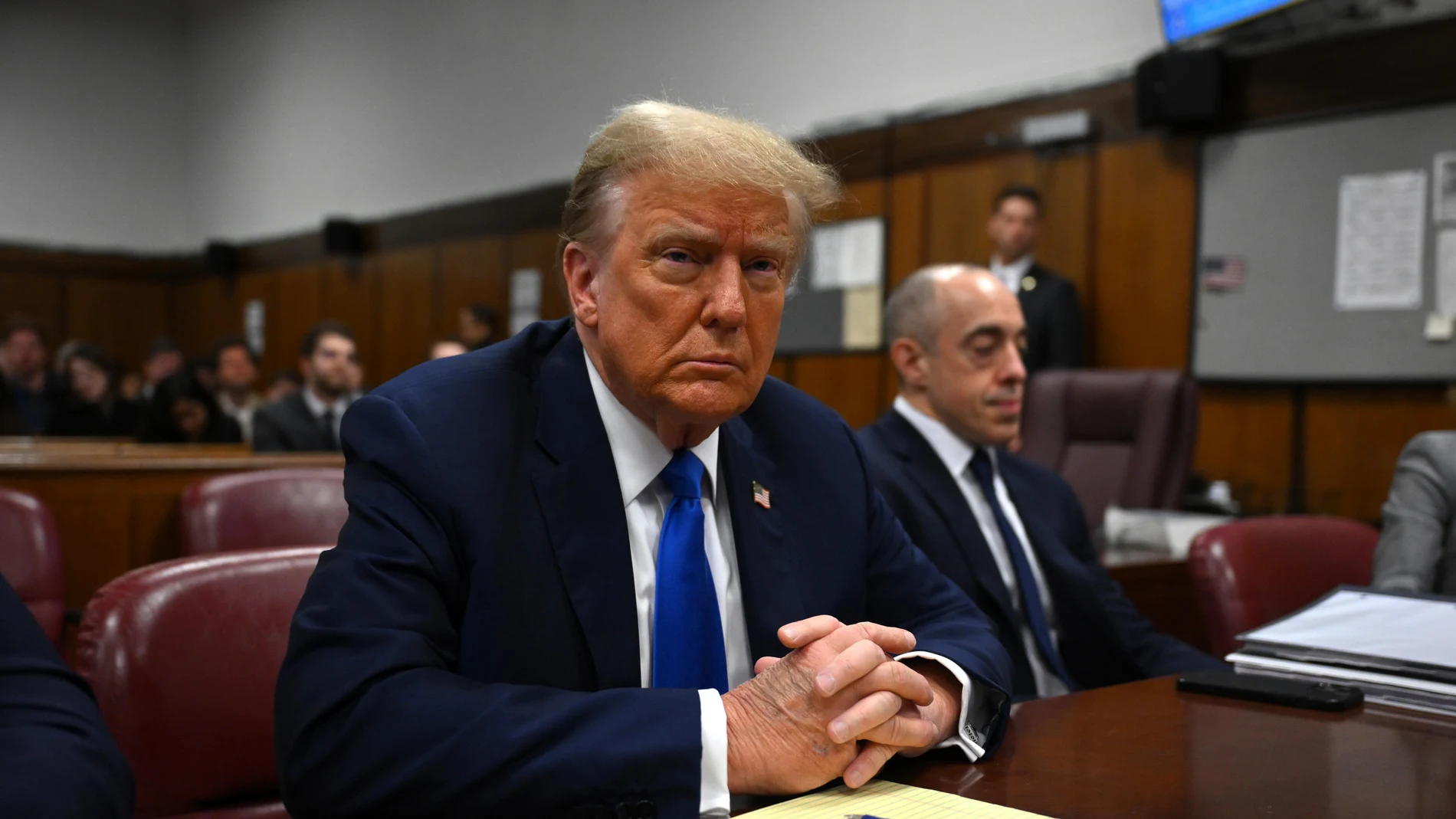 Former US President and current Republican presidential candidate Donald Trump awaits the start of proceedings at Manhattan Criminal Court in New York, New York, USA, 22 April 2024.