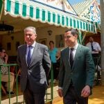 José Luis Sanz y Juanma Moreno, en la Feria