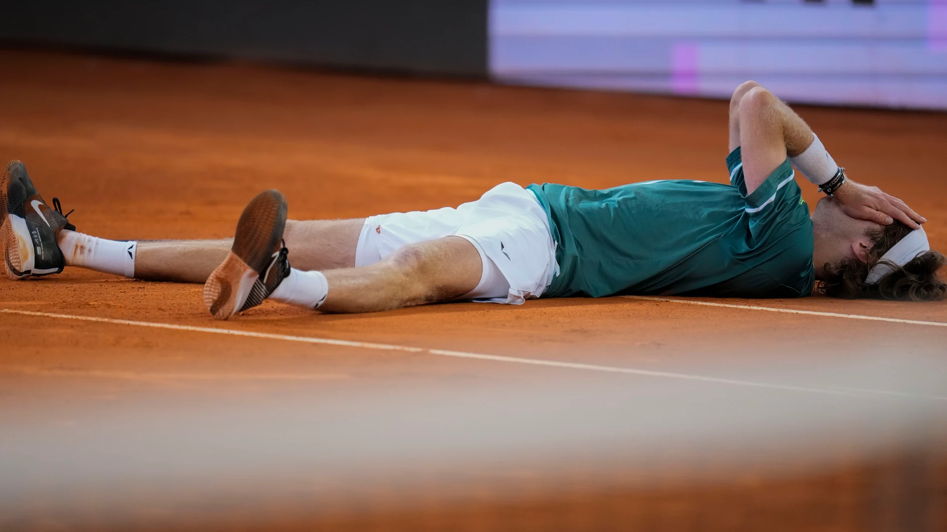 Andrey Rublev, of Russia, celebrates after winning the final match against Felix Auger-Aliassime, of Canada, at the Madrid Open tennis tournament in Madrid, Spain, Sunday, May 5, 2024. (AP Photo/Manu Fernandez)