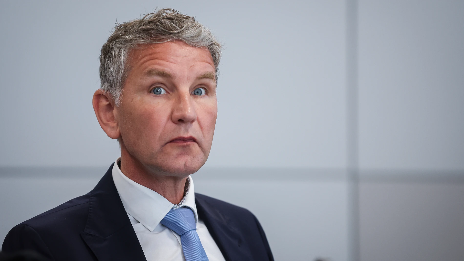 Bjoern Hoecke, co-leader of the far-right Alternative for Germany (AfD) party in the eastern federal state of Thuringia, waits for a session of his trial over the alleged use of Nazi phrases, at the regional court in Halle, Germany, Tuesday, May 14, 2024. (Ronny Hartmann/Pool Photo via AP)