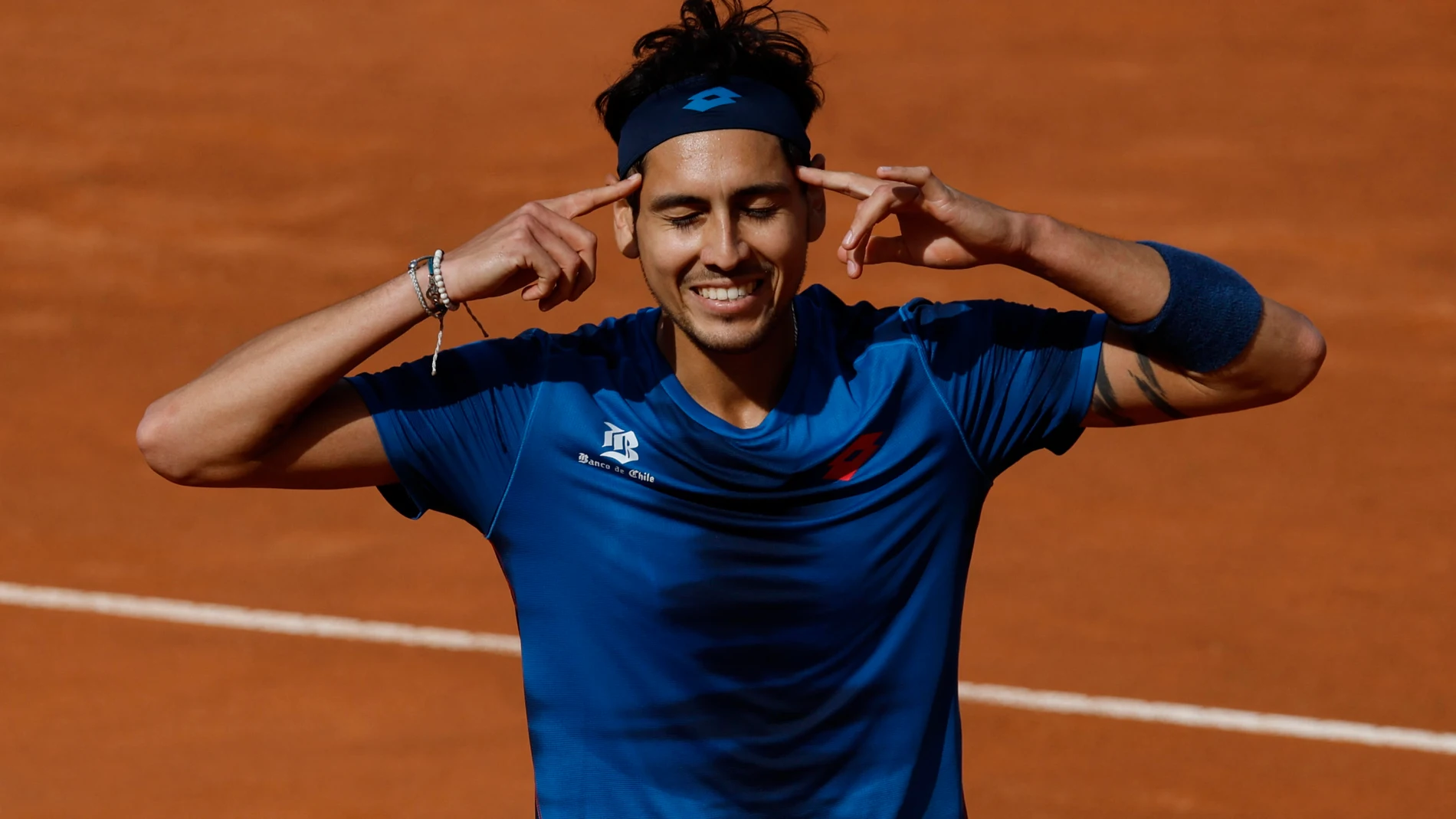 Rome (Italy), 15/05/2024.- Alejandro Tabilo of Chile celebrates after winning his men's singles quarter final round match against Zhang Zhizhen of China (not pictured) at the Italian Open tennis tournament in Rome, Italy, 15 May 2024. (Tenis, Italia, Roma) EFE/EPA/FABIO FRUSTACI