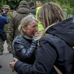 A Ukrainian woman reacts at the evacuation center which receives people who had to leave territories close to the Russian border in Kharkiv, Ukraine, 15 May 2024 amid the Russian invasion.