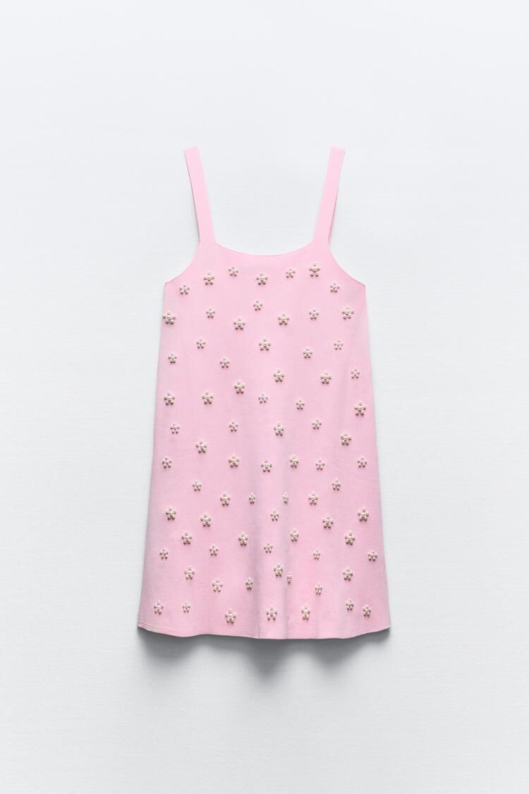 Vestido perlas.
