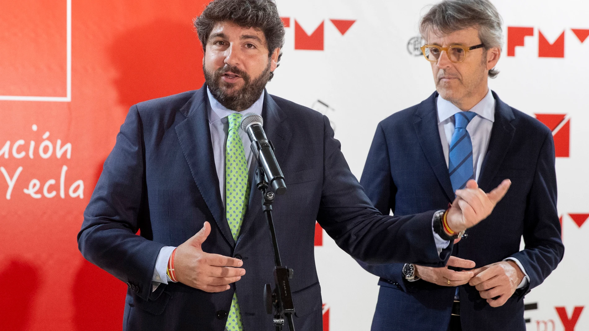 YECLA (MURCIA), 28/05/2024.- El presidente de la Comunidad de Murcia Fernando López Miras (i) acompañado por el consejero de economía Luis Alberto Marín (d), atiende a los medios de comunicación, este martes durante un momento de la inauguración de la 62º edición de la Feria del Mueble de Yecla. EFE/Marcial Guillén
