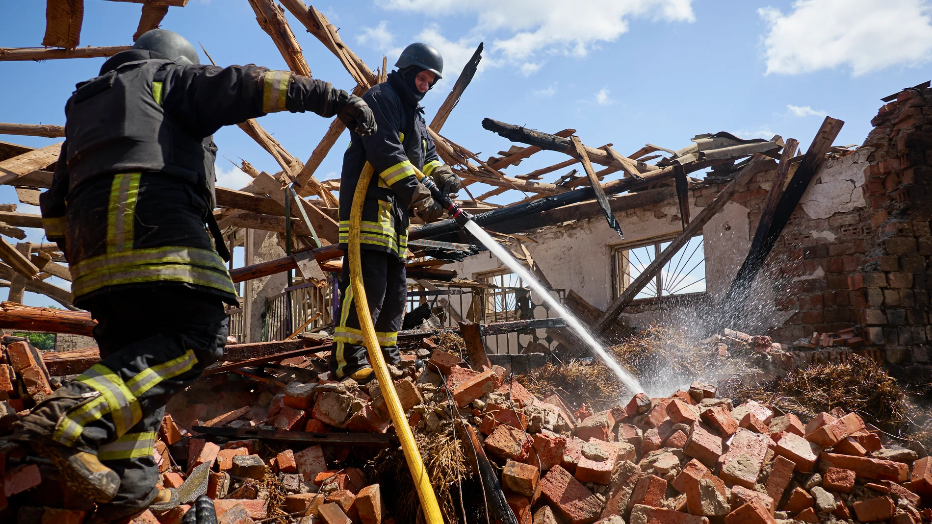 Kharkiv (Ukraine), 30/05/2024.- Ukrainian rescuers work at a site of a rocket hit to the riding hall of the Equestrian Center of the Veterinary Academy in Mala Danylivka village near Kharkiv, Ukraine, 30 May 2024 amid the Russian invasion. The Kharkiv Veterinary Academy was founded in 1804 and its Equestrian Center is a historical building. Nobody was killed or injured during the attack according to the report of the head of the Kharkiv Military Administration Oleg Synegubov. Russian troops e...